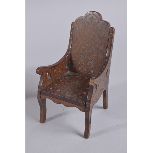 116 - AN UNUSUAL 19TH CENTURY INDIAN HOSHIAPUR BRASS INLAID MINIATURE WOODEN TABLE AND ARMCHAIR, probably ... 