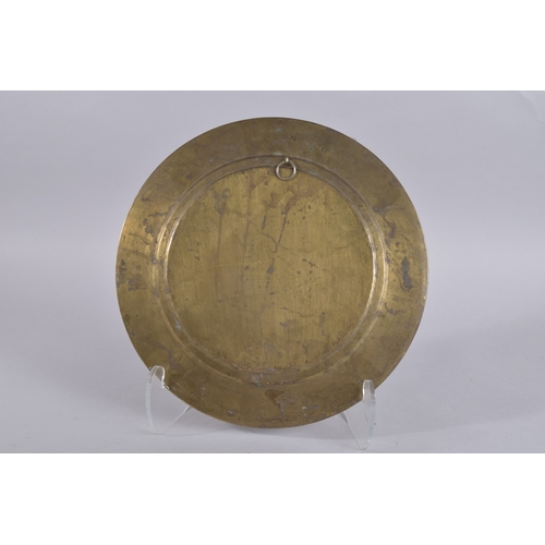 120 - A FINE LARGE SOUTH INDIAN TANJORE SILVER AND COPPER OVERLAID BRASS CHARGER, 33cm diameter.