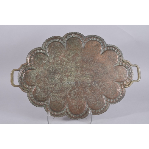 131 - A VERY FINELY ENGRAVED 19TH CENTURY INDIAN KASHMIRI COPPER TRAY, with standing lions on each of the ... 