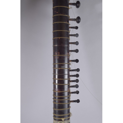 133 - A VERY FINE 19TH CENTURY INDIAN BONE MOUNTED SITAR MUSICAL INSTRUMENT, 12.5cm long.