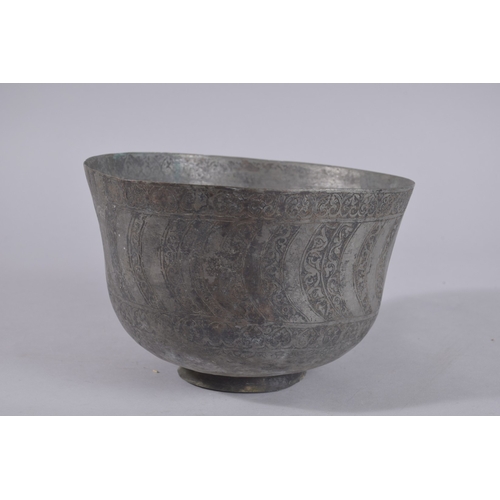 241 - A LATE PERSIAN QAJAR ENGRAVED TINNED COPPER BOWL, 22cm wide.