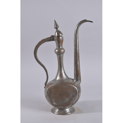 242 - AN EARLY 20TH CENTURY QAJAR OR AFGHAN TINNED COPPER EWER, 39cm high.