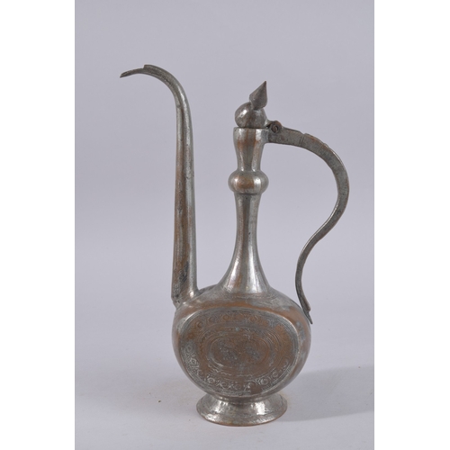 242 - AN EARLY 20TH CENTURY QAJAR OR AFGHAN TINNED COPPER EWER, 39cm high.