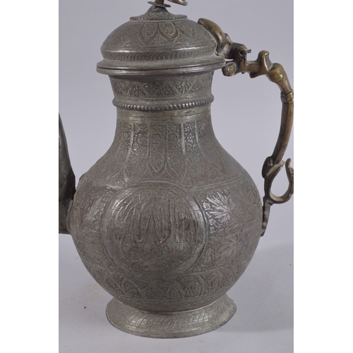 243 - AN EARLY 20TH CENTURY AFGHAN ENGRAVED BRONZE LIDDED EWER, with calligraphic roundel to each side, 34... 