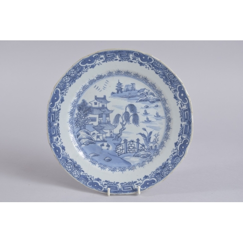 38 - A 19TH CENTURY CHINESE BLUE AND WHITE PORCELAIN DISH, painted with a landscape scene, (faults), 23cm... 