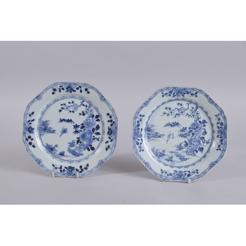 39 - A PAIR OF 18TH CENTURY CHINESE BLUE AND WHITE PORCELAIN DISHES, painted with flora and cranes, 22.5c... 