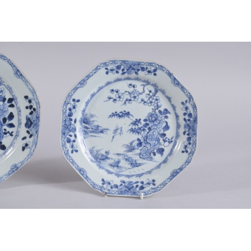 39 - A PAIR OF 18TH CENTURY CHINESE BLUE AND WHITE PORCELAIN DISHES, painted with flora and cranes, 22.5c... 