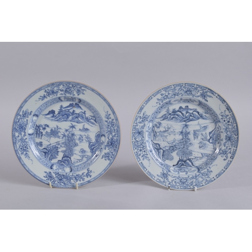 40 - A PAIR OF 18TH CENTURY CHINESE BLUE AND WHITE PORCELAIN DISHES, painted with landscape scenes and fl... 