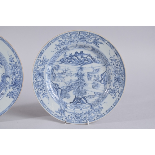 40 - A PAIR OF 18TH CENTURY CHINESE BLUE AND WHITE PORCELAIN DISHES, painted with landscape scenes and fl... 