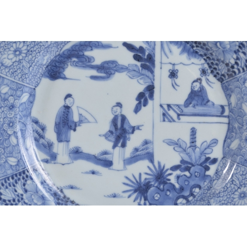 41 - AN 18TH CENTURY CHINESE BLUE AND WHITE PORCELAIN PLATE, painted with female figures in a garden and ... 