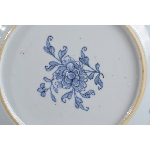 41 - AN 18TH CENTURY CHINESE BLUE AND WHITE PORCELAIN PLATE, painted with female figures in a garden and ... 