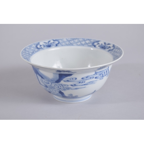 42 - A CHINESE KANGXI PERIOD BLUE AND WHITE PORCELAIN BOWL, painted with female figures and boys, the bas... 