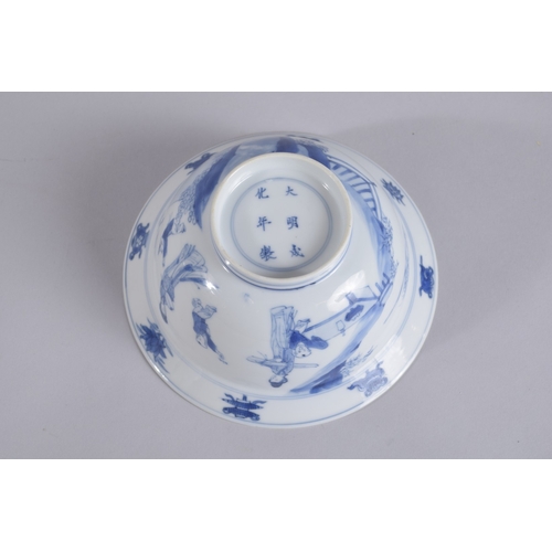 42 - A CHINESE KANGXI PERIOD BLUE AND WHITE PORCELAIN BOWL, painted with female figures and boys, the bas... 