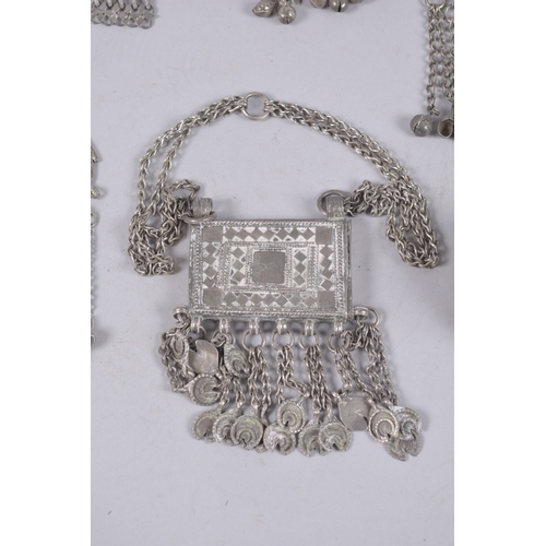 425 - A COLLECTION OF ETHNIC WHITE METAL JEWELLERY, (qty).