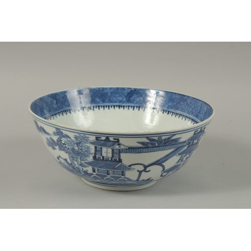 447 - A CHINESE BLUE AND WHITE PORCELAIN BOWL, with four-character mark, 26cm diameter.