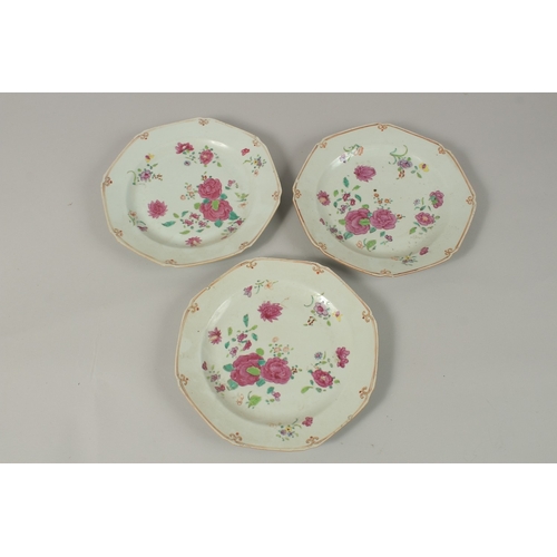 449 - THREE CHINESE FAMILLE ROSE PORCELAIN PLATES, 23cm wide, (3).