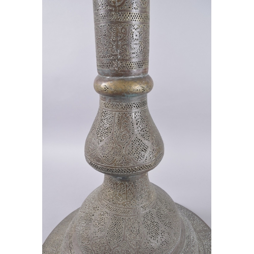 435 - AN ISLAMIC SYRIAN OPENWORKED BRASS TORCH STAND / FLOOR LAMP, with panels of calligraphy, 153cm high.