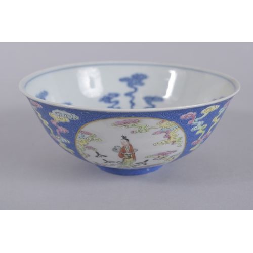 44 - A CHINESE DAOGUANG BLUE GROUND FAMILLE ROSE PORCELAIN MEDALLION BOWL, mark and period, the exterior ... 