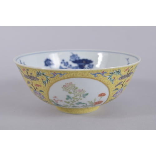 45 - A CHINESE DAOGUANG YELLOW GROUND FAMILLE ROSE PORCELAIN MEDALLION BOWL, mark and period, the exterio... 