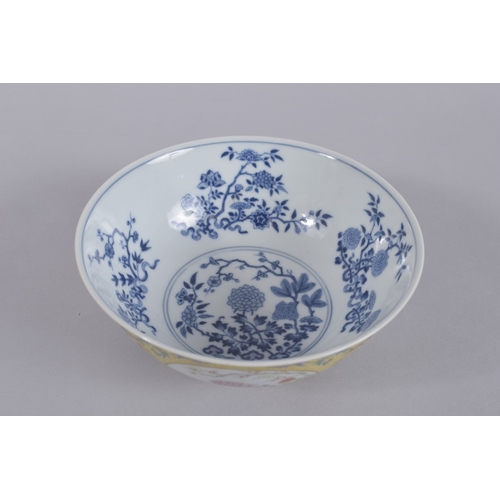 45 - A CHINESE DAOGUANG YELLOW GROUND FAMILLE ROSE PORCELAIN MEDALLION BOWL, mark and period, the exterio... 