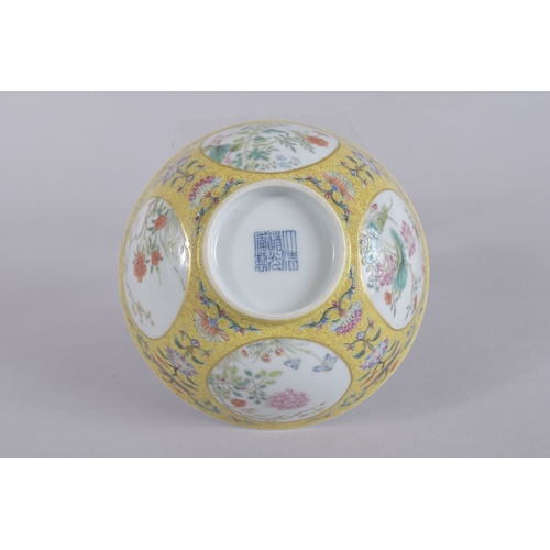 45 - A CHINESE DAOGUANG YELLOW GROUND FAMILLE ROSE PORCELAIN MEDALLION BOWL, mark and period, the exterio... 