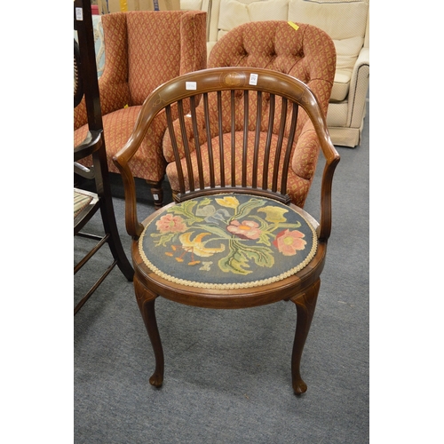 272 - An Edwardian inlaid mahogany armchair with needlework upholstered seat.