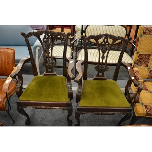 276 - A pair of Chippendale style mahogany carver chairs.