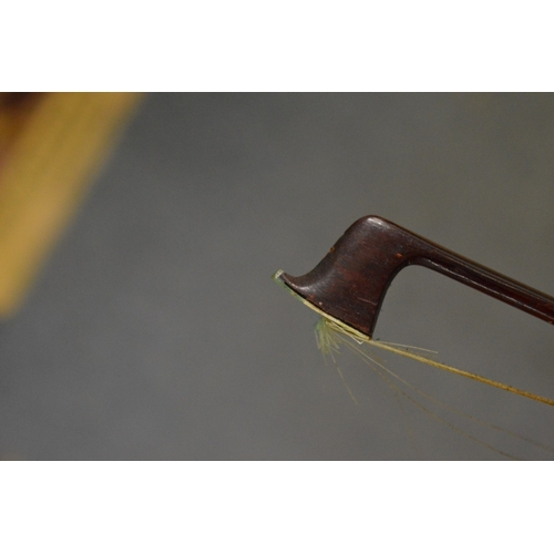 641 - A violin or cello bow stamped Schultz.