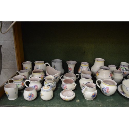 652 - A good collection of Poole pottery to include numerous jugs, bowls, vases etc.