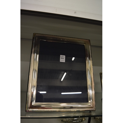 836 - A large silver plated photograph frame.