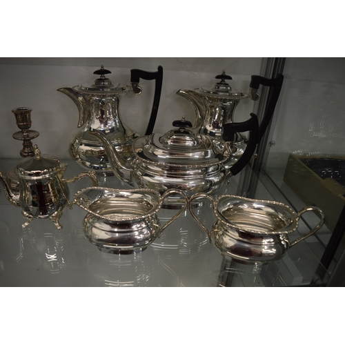 838 - A quantity of plated items to include a tea service, cased fish servers etc.