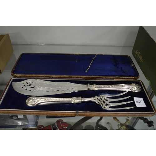 842 - A cased pair of silver plated fish servers.