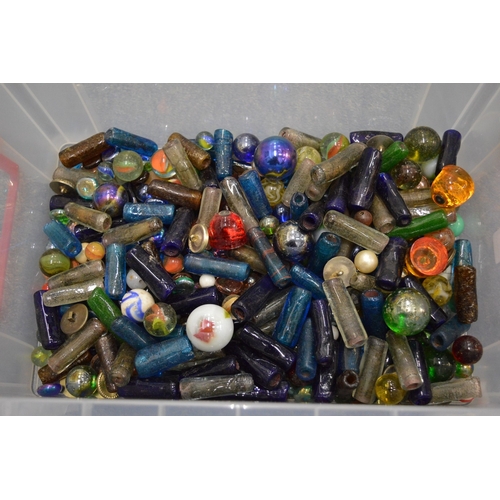 861 - A quantity of marbles and other glassware.