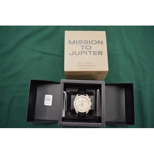 978 - An Omega Swatch Mission to Jupiter wristwatch with original box and papers.