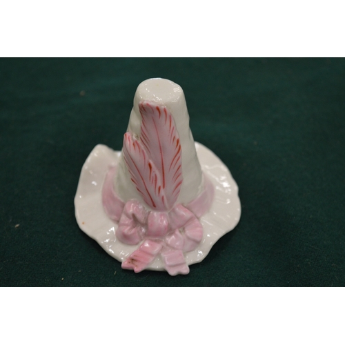 996 - A Royal Worcester candle snuffer in the form of a hat.