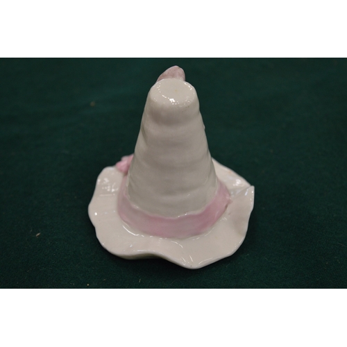 996 - A Royal Worcester candle snuffer in the form of a hat.