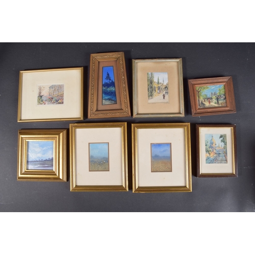 102 - A COLLECTION EIGHT MINIATURE WATERCOLOURS including a view of Sacre Coeur, Paris and a street scene ... 