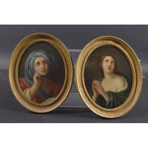 179 - ITALIAN SCHOOL (19TH CENTURY) AFTER GUIDO RENI a pair of oil on board portraits of female figures, o... 