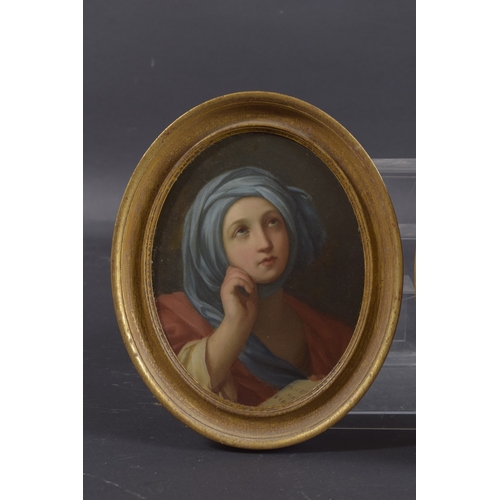 179 - ITALIAN SCHOOL (19TH CENTURY) AFTER GUIDO RENI a pair of oil on board portraits of female figures, o... 