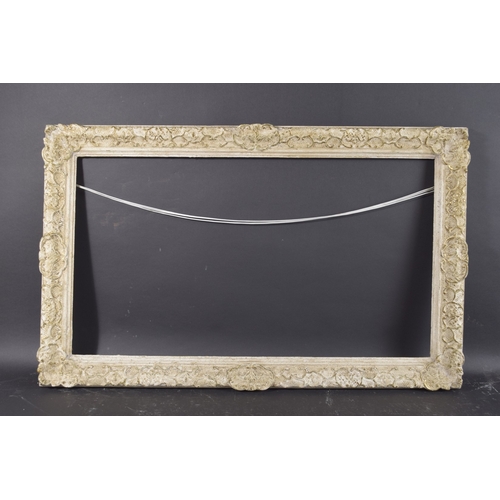 48 - A PAINTED AND PARTIALLY GILT MODERN BRITISH FRAME Rebate size 18