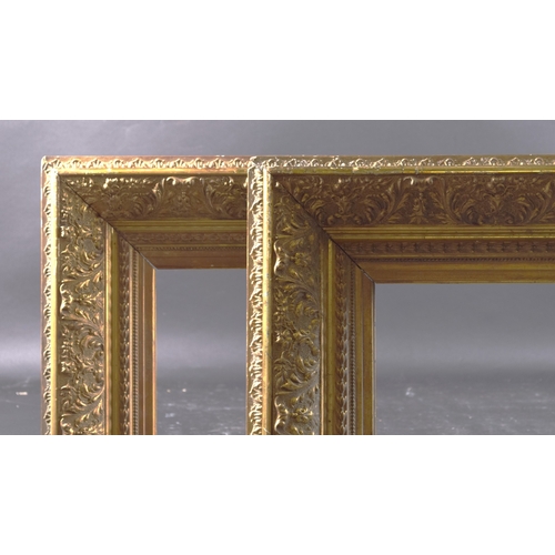 49 - A PAIR OF LARGE GILTWOOD AND GESSO FRAMES rebate size 34.5