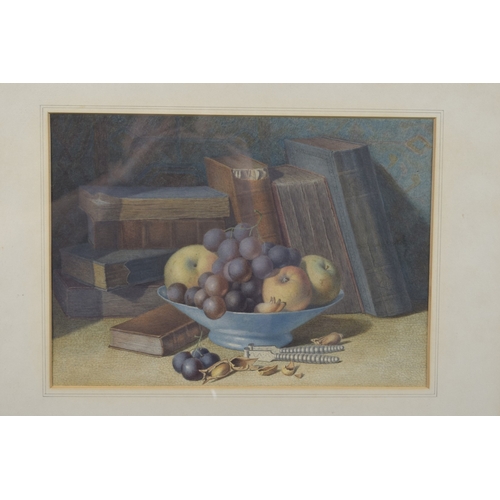 70 - 19TH CENTURY SCHOOL Still life with books and a bowl of fruit, watercolour, 9.5