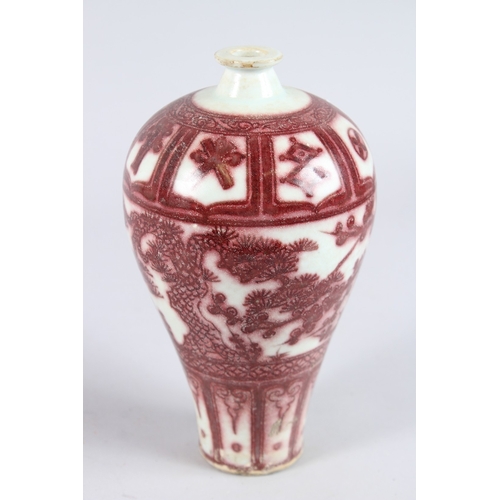 121 - A CHINESE PORCELAIN MEIPING SHAPE VASE with underglaze red decortion. 23cms high.