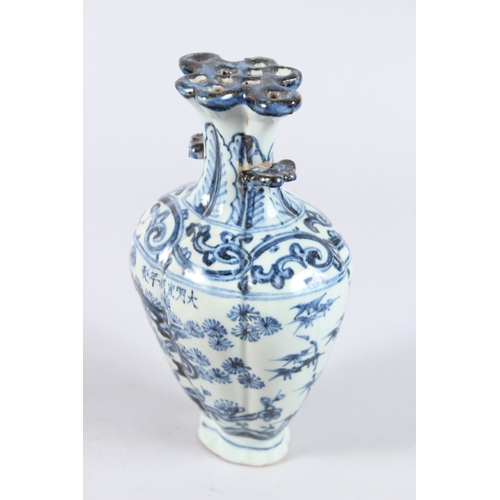 122 - A CHINESE PORCELAIN BLUE AND WHITE VASE of moulded form, with pierced flower stem neck, painted with... 