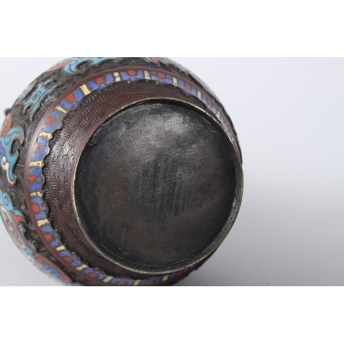 134 - A PAIR OF CHINESE BRONZE AND CLOISONNE TWO HANDLED VASES. 10ins high.