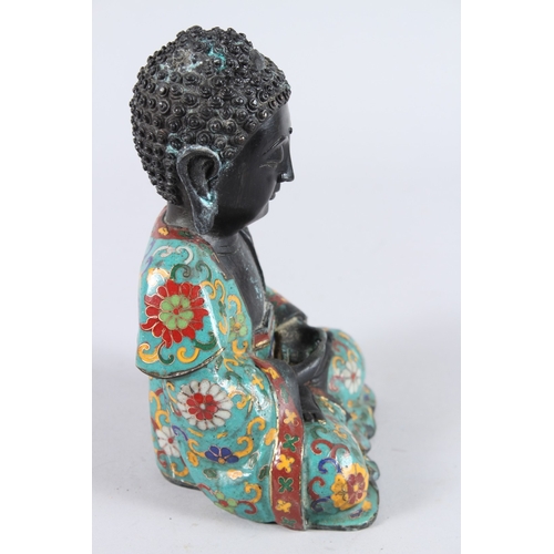 158 - A CHINESE CLOISONNE FIGURE OF A SEATED BUDDHA, hands clasped together. 22cms high.