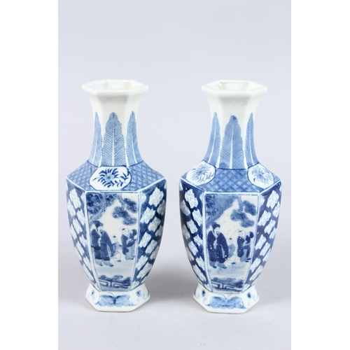 159 - A PAIR OF CHINESE BLUE AND WHITE PORCELAIN HEXAGONAL SHAPED BOTTLE VASES, decorated with panel of fi... 