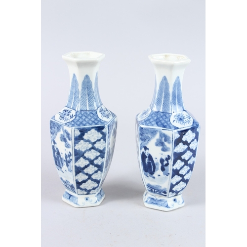 159 - A PAIR OF CHINESE BLUE AND WHITE PORCELAIN HEXAGONAL SHAPED BOTTLE VASES, decorated with panel of fi... 