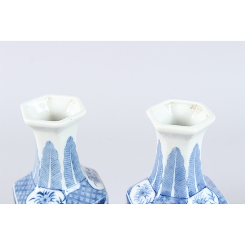 159 - A PAIR OF CHINESE BLUE AND WHITE PORCELAIN HEXAGONAL SHAPED BOTTLE VASES, decorated with panel of fi... 