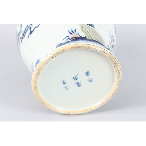 170 - A CHINESE PORCELAIN BLUE AND WHITE JAR, unusually decorated with a moulded design depicting a dragon... 